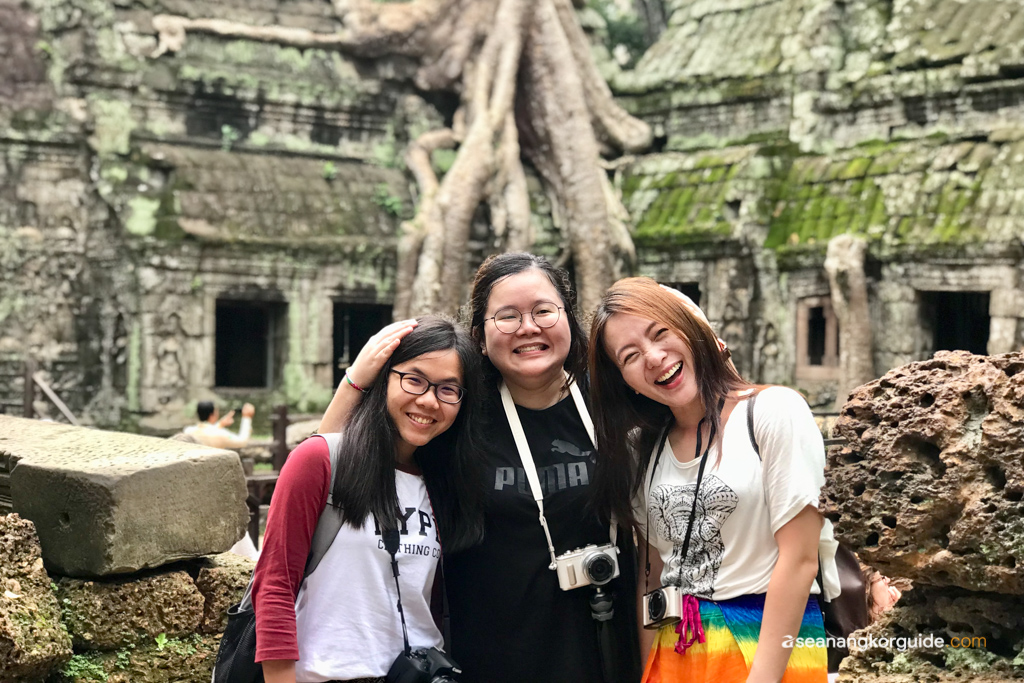 Happy tourists at Ta Prohm temple